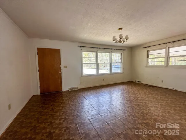 an empty room with windows