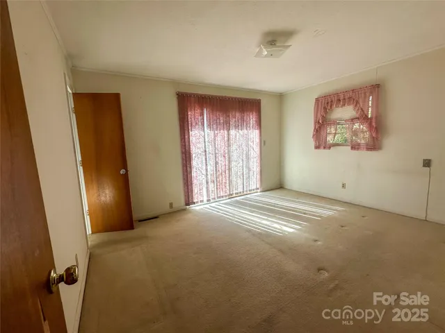 an empty room with windows