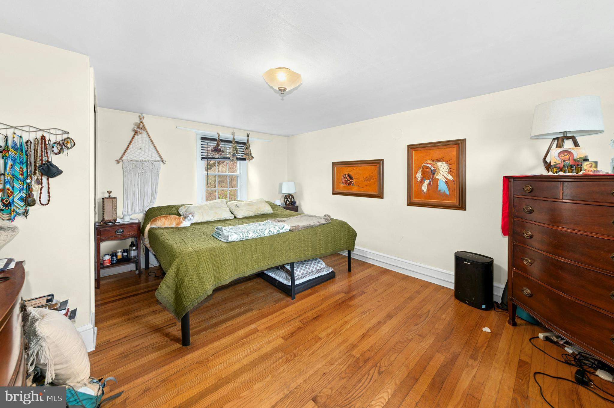 4196 Toll Gate Road New Hope, PA 18938 - Photo 15 of 19 a bedroom with a bed and wooden floor