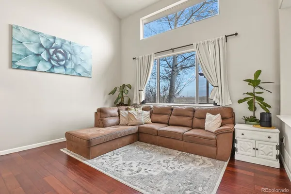 a living room with furniture and a couch