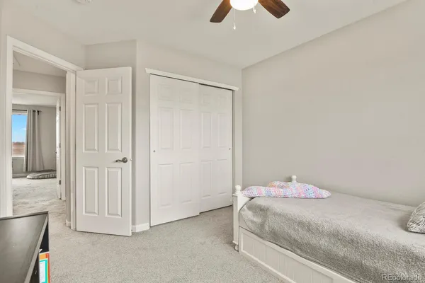 a view of a livingroom with gym equipment