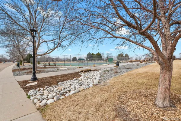a view of an outdoor space and tennis court