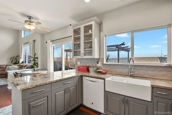 a kitchen with a sink and a window