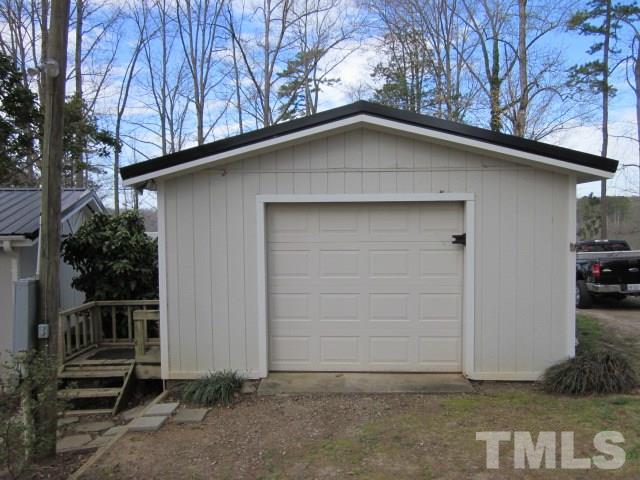 285 Kerr Lake Road Henderson, NC 27537 - Photo 4 of 25 a house with trees in the background