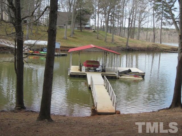 285 Kerr Lake Road Henderson, NC 27537 - Photo 5 of 25 a view of a wooden deck