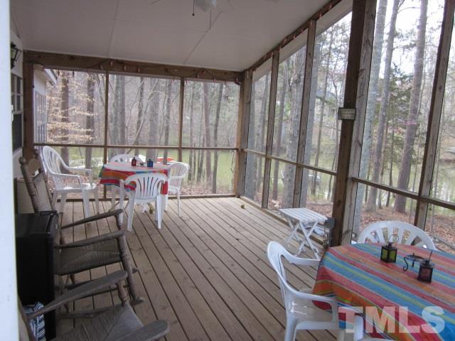 285 Kerr Lake Road Henderson, NC 27537 - Photo 10 of 25 a bed room with furniture and a window