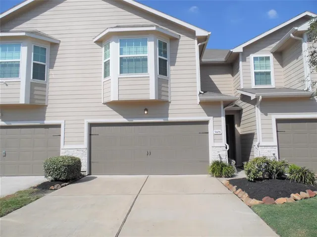 a front view of house with yard