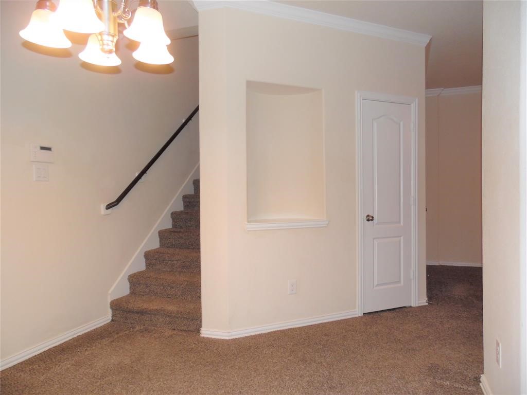 5106 Gable Lane Houston, TX 77066 - Photo 14 of 39 a view of an entryway with wooden floor
