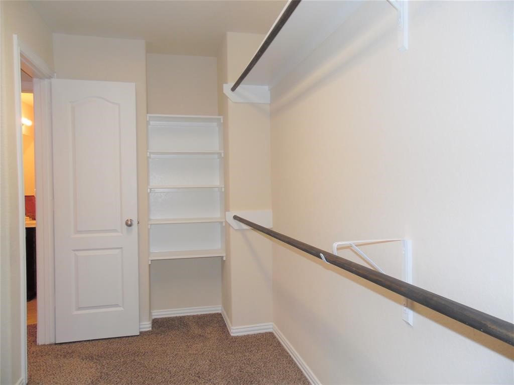 5106 Gable Lane Houston, TX 77066 - Photo 19 of 39 a view of an empty walk in closet