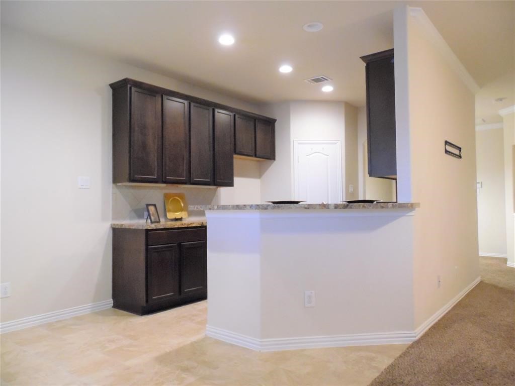 5106 Gable Lane Houston, TX 77066 - Photo 8 of 39 a kitchen with stainless steel appliances granite countertop a refrigerator and a stove top oven