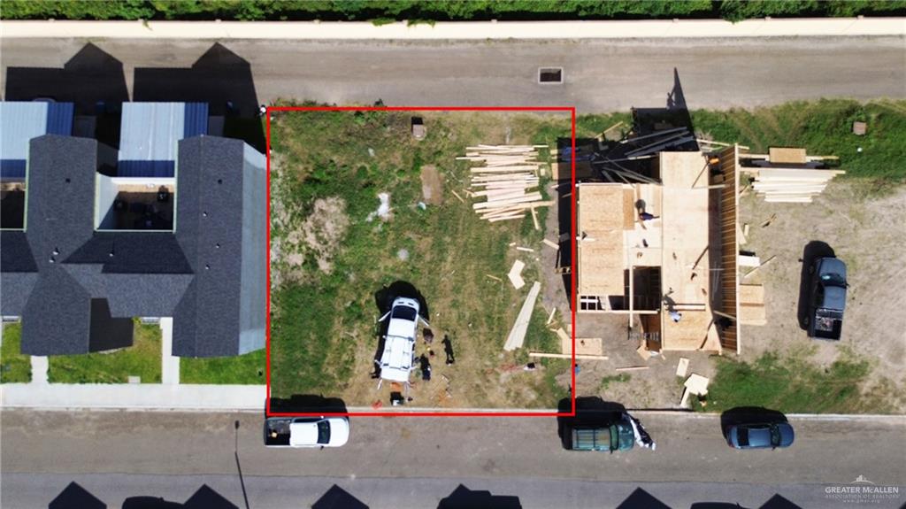 5409 North Crown Point Pharr, TX 78577 - Photo 2 of 16 an aerial view of residential houses with outdoor space and parking