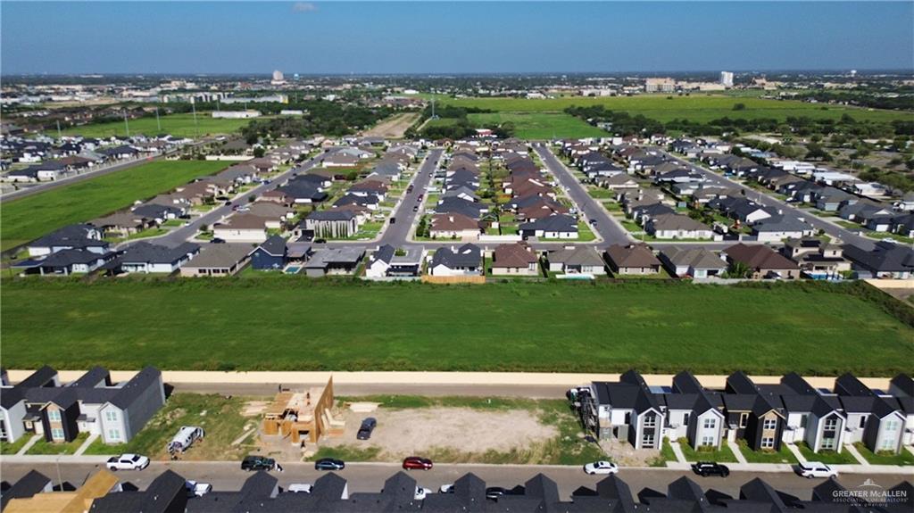 5409 North Crown Point Pharr, TX 78577 - Photo 5 of 16 an aerial view of a house with a garden and lots of trees