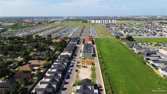 an aerial view of a yard with outdoor seating