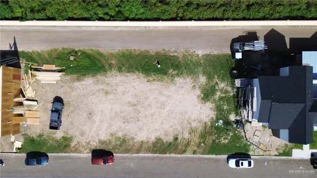 a view of a living room with furniture and chandelier