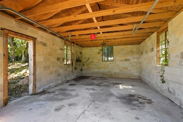 a view of a room with windows