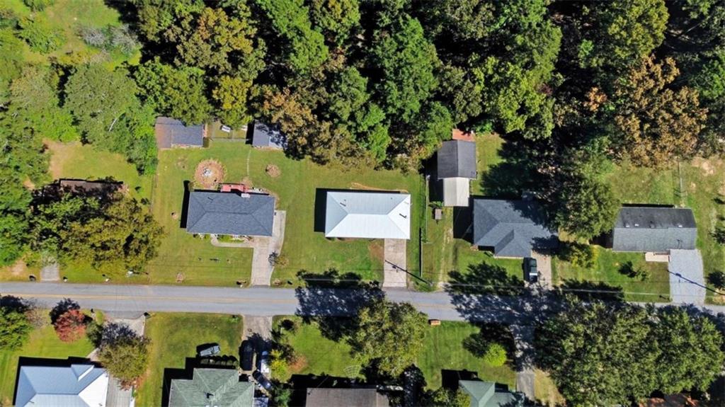 229 Hilltop Lane Toccoa, GA 30577 - Photo 26 of 30 an aerial view of a house with a yard