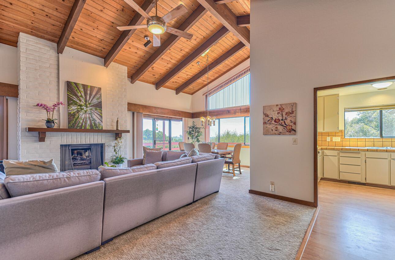 14036 Reservation Road Salinas, CA 93908 - Photo 13 of 50 a living room with furniture and a fireplace