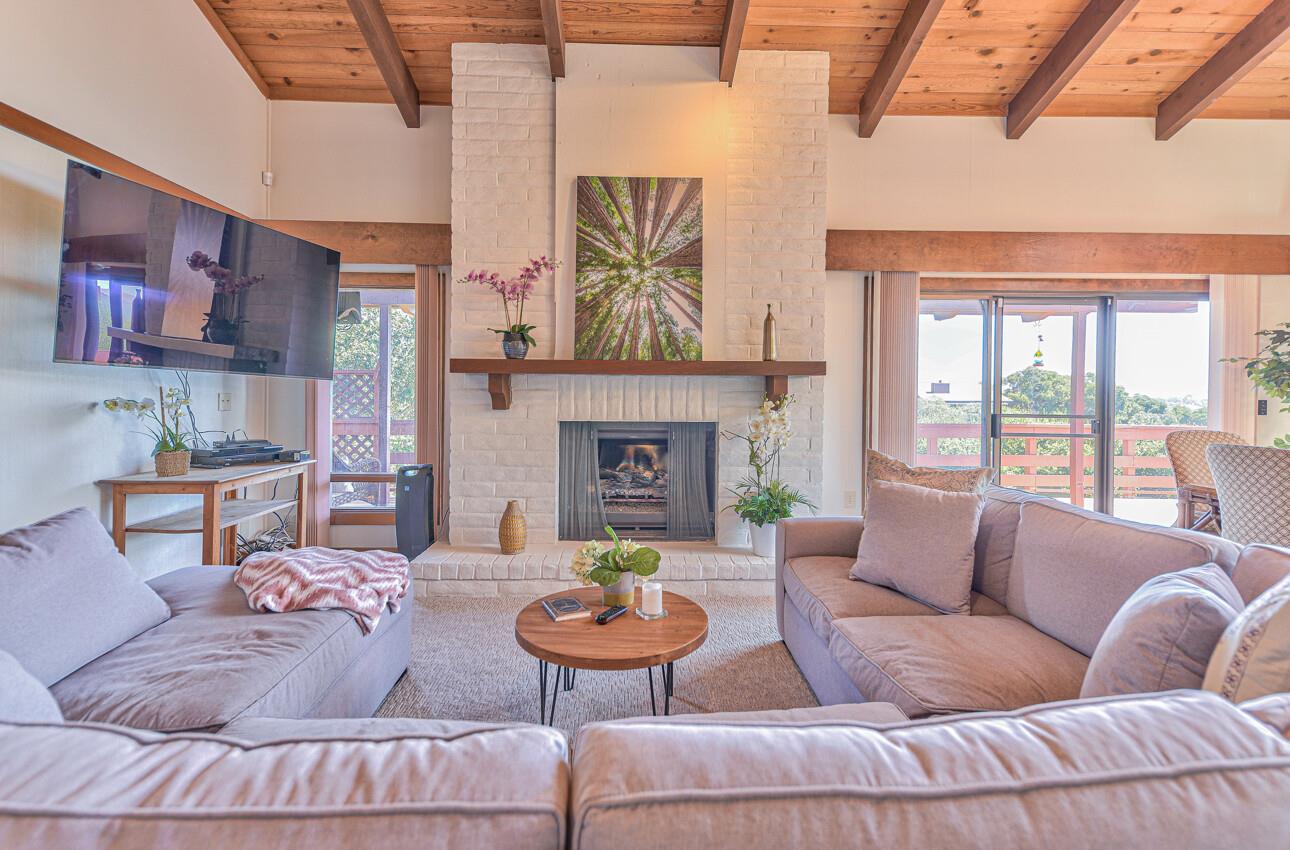 14036 Reservation Road Salinas, CA 93908 - Photo 14 of 50 a living room with furniture and a fireplace