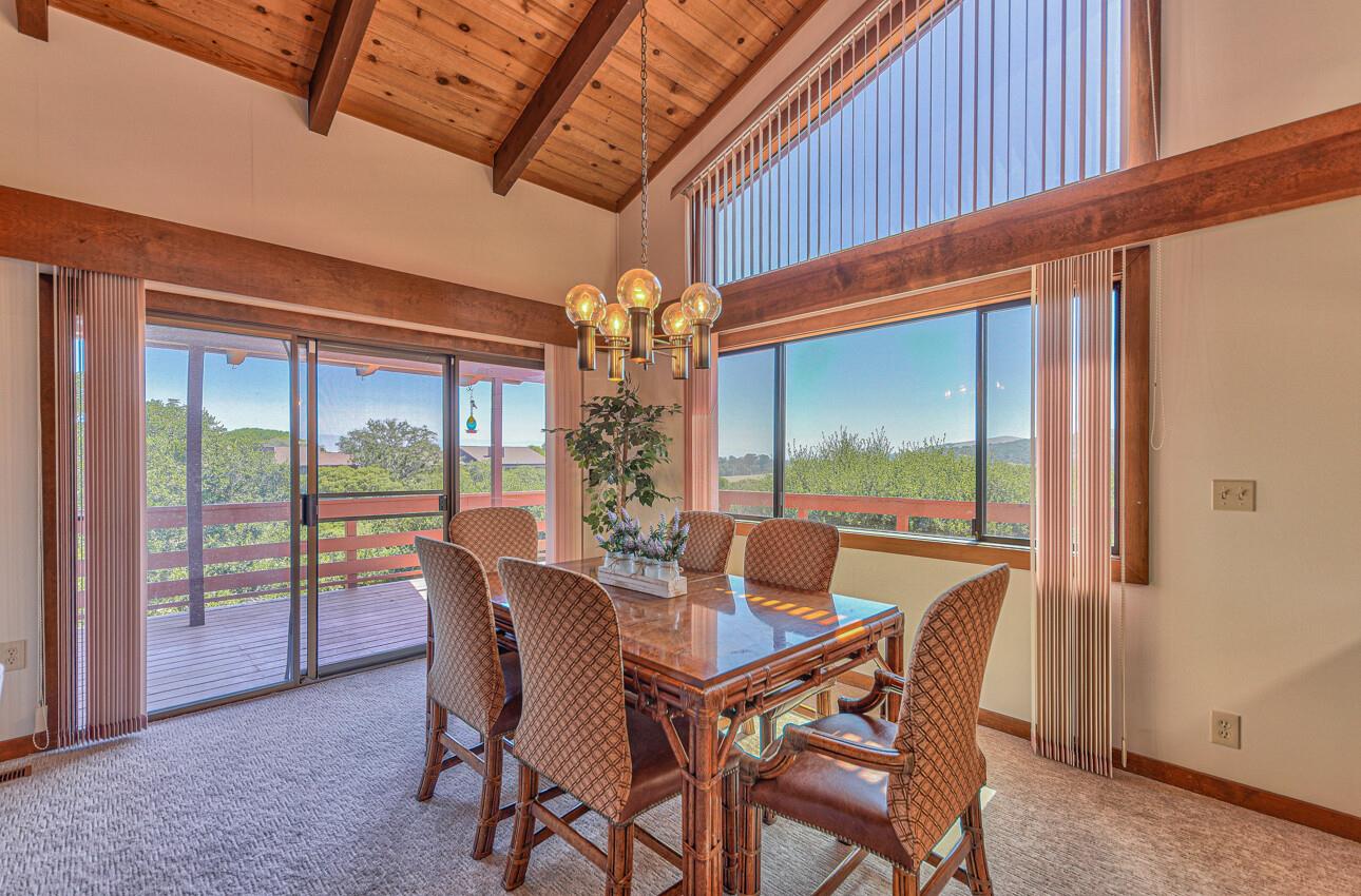 14036 Reservation Road Salinas, CA 93908 - Photo 19 of 50 a dining room with furniture wooden floor and a potted plant