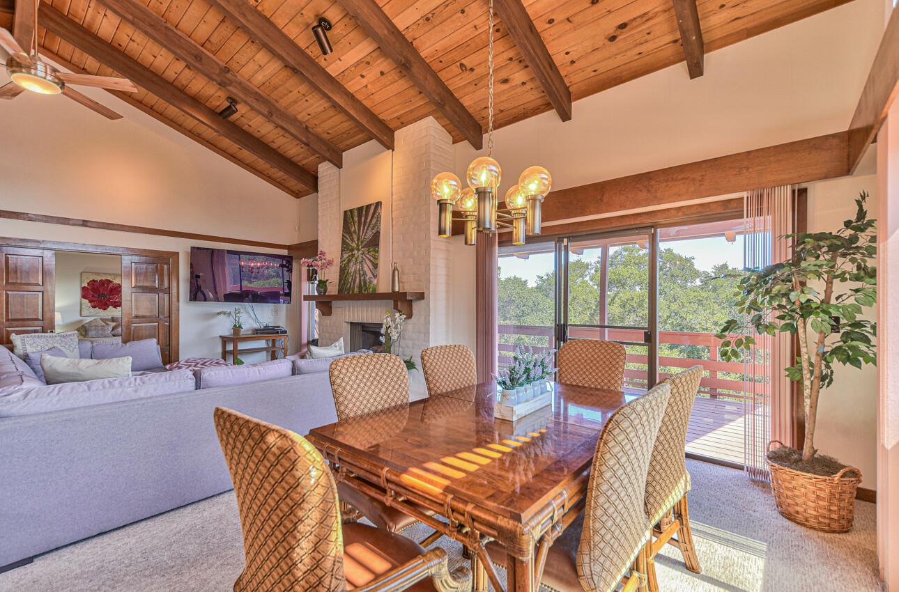 14036 Reservation Road Salinas, CA 93908 - Photo 20 of 50 a dining room with furniture a chandelier and wooden floor