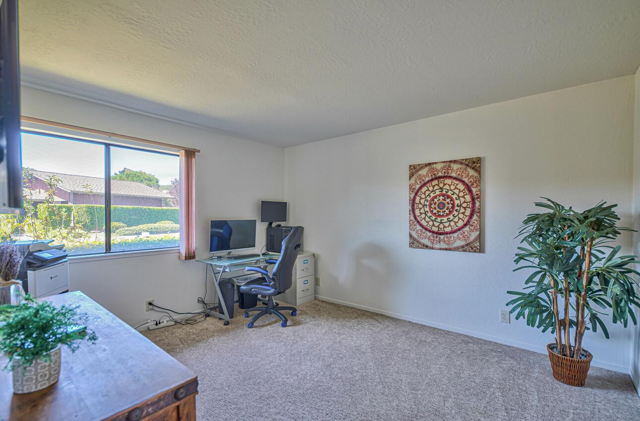 14036 Reservation Road Salinas, CA 93908 - Photo 40 of 50 a work room with furniture and a potted plant