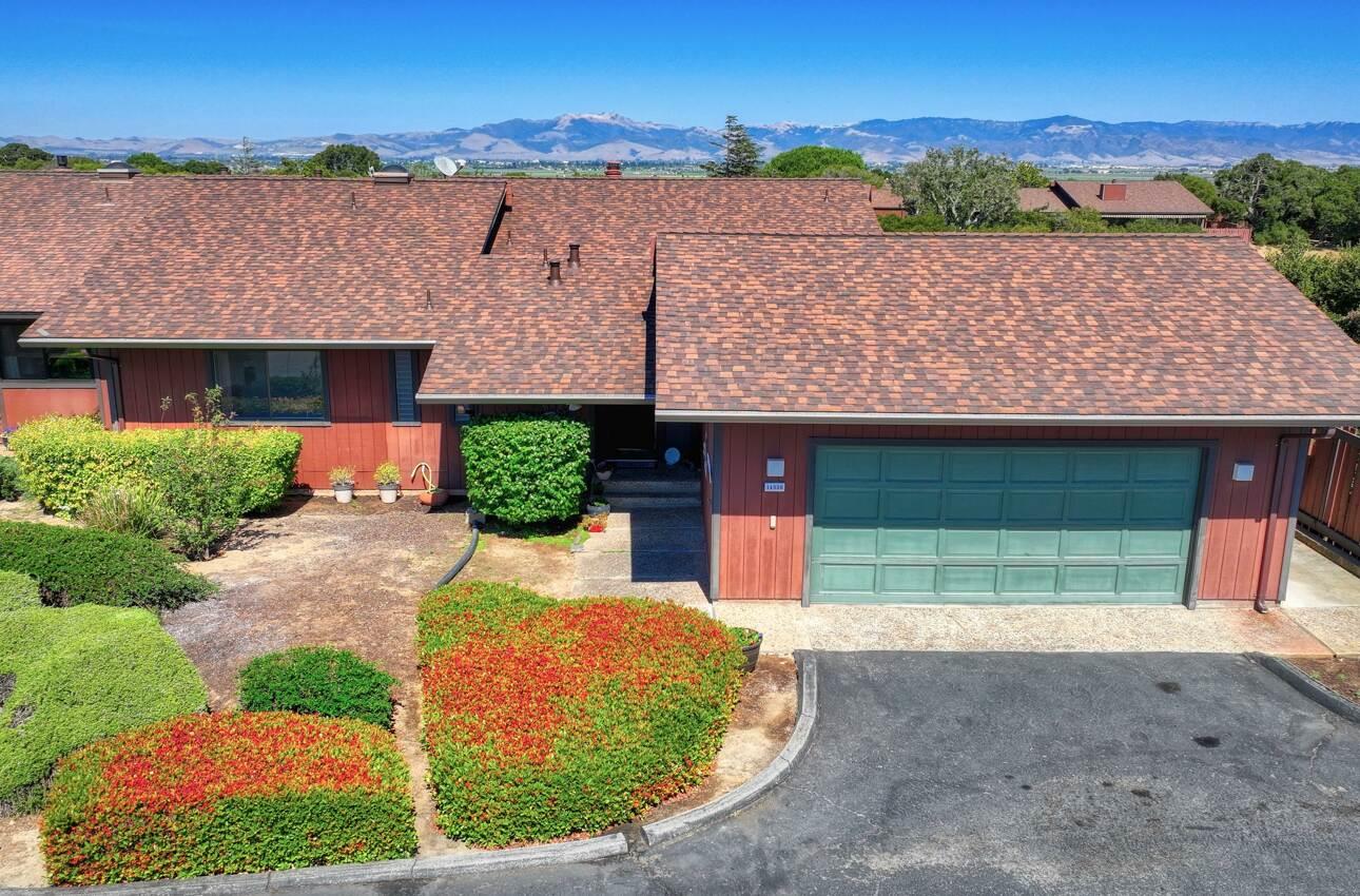 14036 Reservation Road Salinas, CA 93908 - Photo 5 of 50 a view of a house with a yard and garage