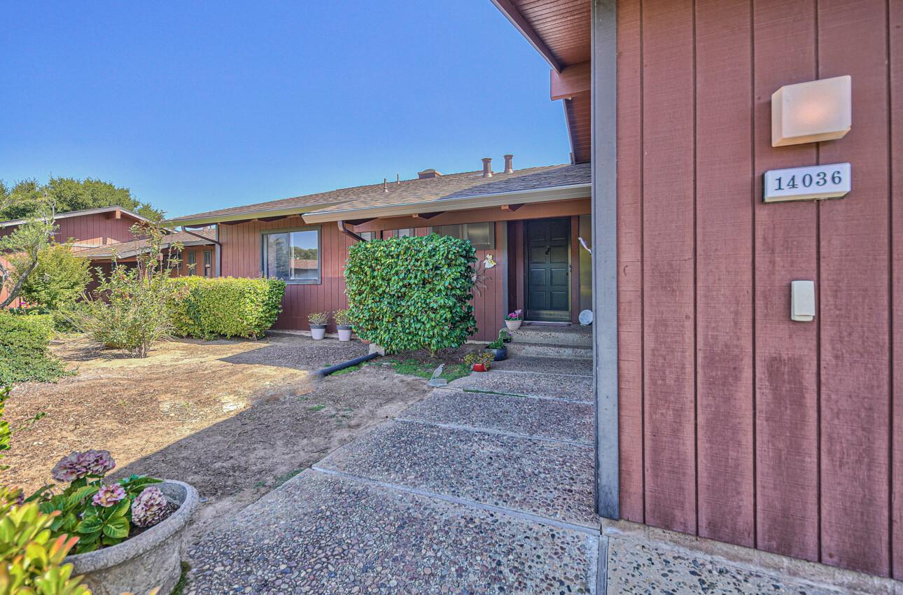 14036 Reservation Road Salinas, CA 93908 - Photo 10 of 50 a front view of a house with garden