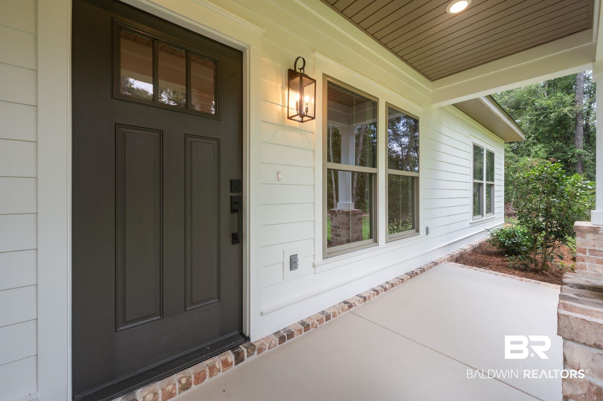 12412 Mannich Lane Foley, AL 36535 - Photo 4 of 23 Property entrance featuring covered porch