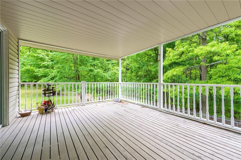 238 Greenbrier Road Acme, PA 15610 - Photo 12 of 15 a view of balcony with wooden floor