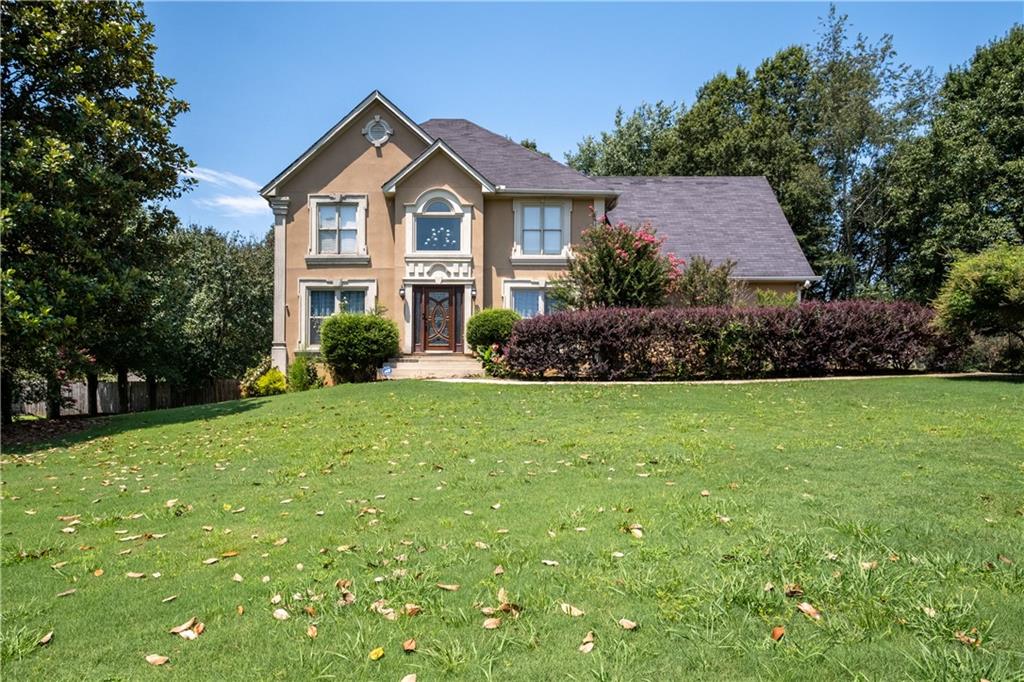 969 Lakeview Road Grayson, GA 30017 - Photo 1 of 1 a front view of a house with a yard