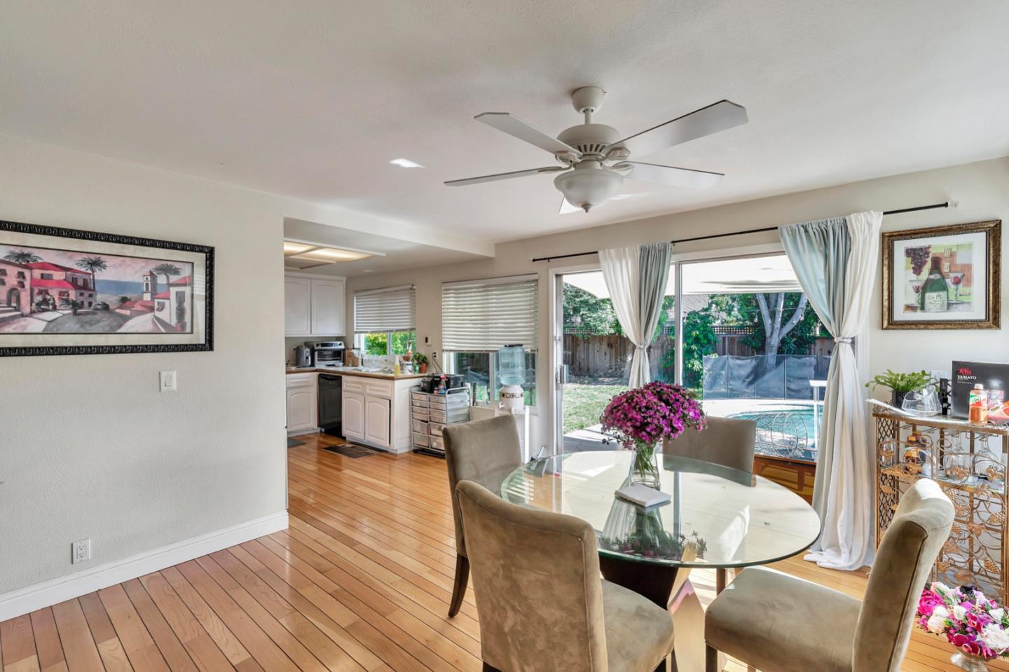 7400 Filice Drive Gilroy, CA 95020 - Photo 11 of 25 a view of a dining room with furniture window and outside view