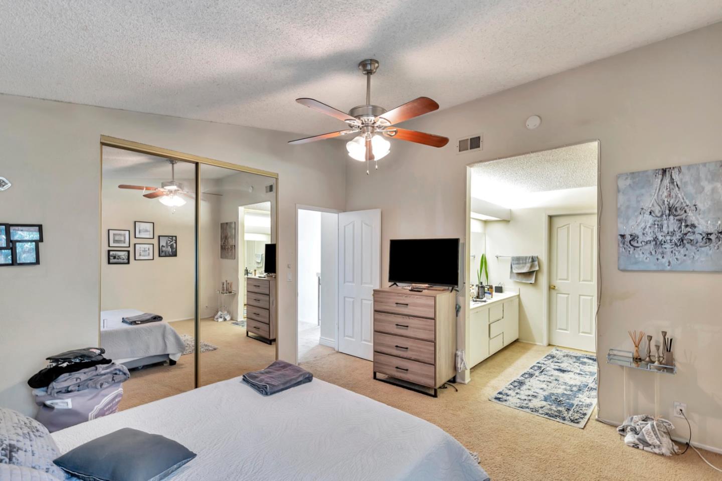 7400 Filice Drive Gilroy, CA 95020 - Photo 17 of 25 a bedroom with a bed and a flat screen tv