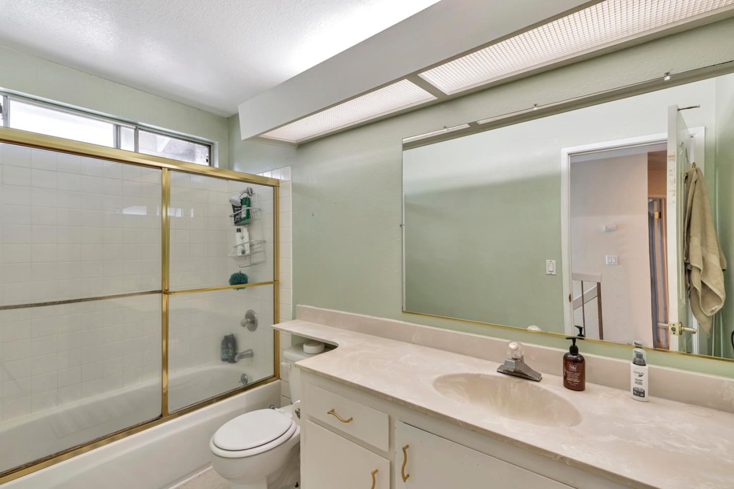 7400 Filice Drive Gilroy, CA 95020 - Photo 21 of 25 a bathroom with a sink toilet and shower