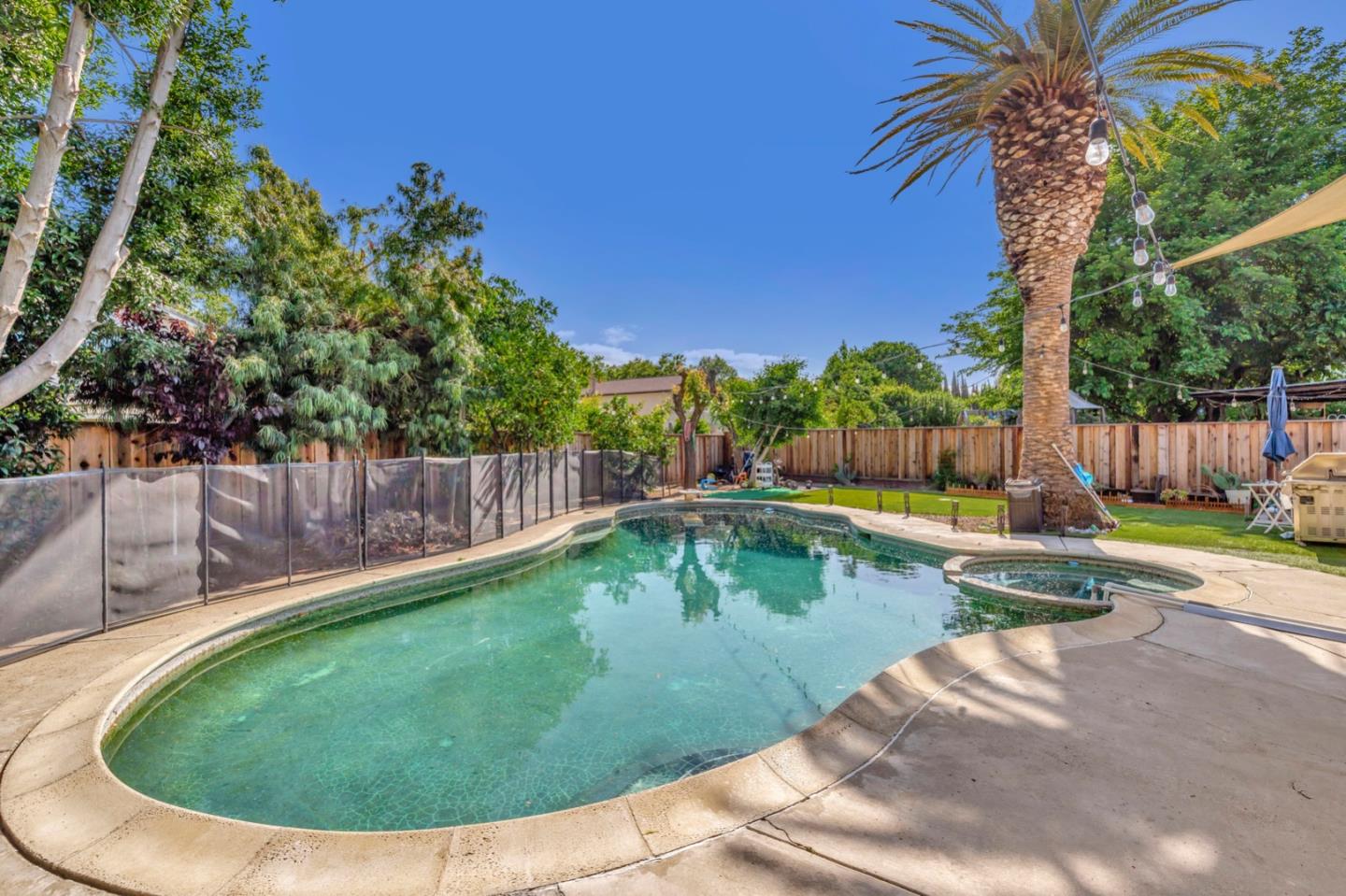 7400 Filice Drive Gilroy, CA 95020 - Photo 24 of 25 a view of a swimming pool with a yard