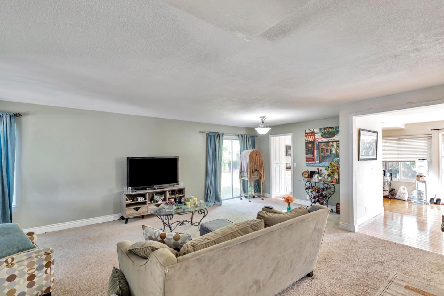 7400 Filice Drive Gilroy, CA 95020 - Photo 4 of 25 a living room with furniture and a flat screen tv