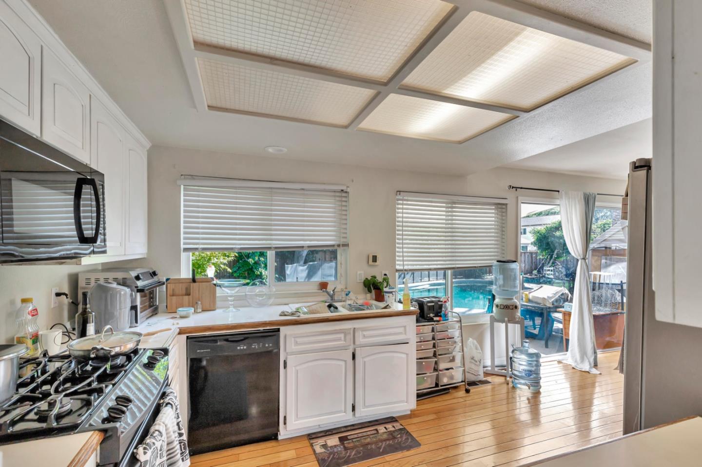 7400 Filice Drive Gilroy, CA 95020 - Photo 8 of 25 a kitchen with a sink stove and cabinets
