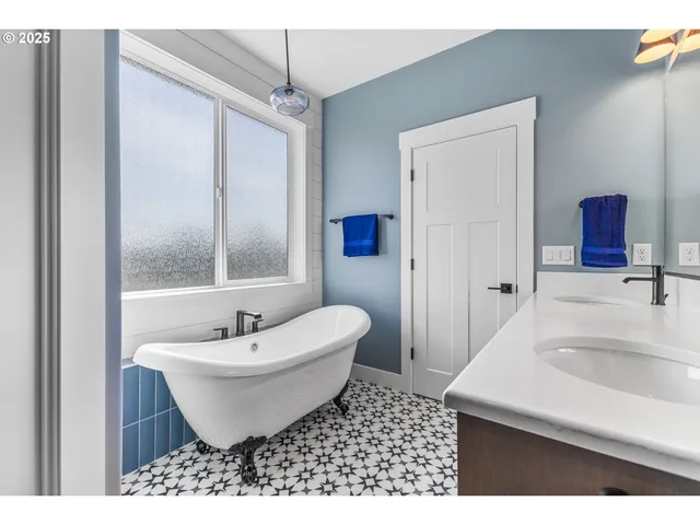 a bathroom with a sink and a bathtub