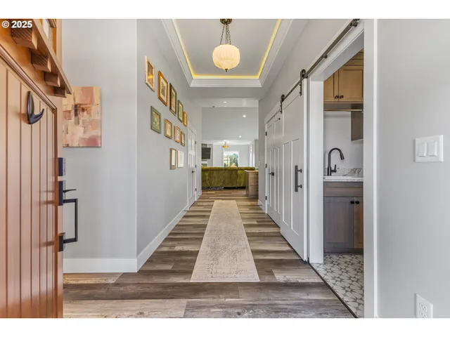 a view of a hallway with windows