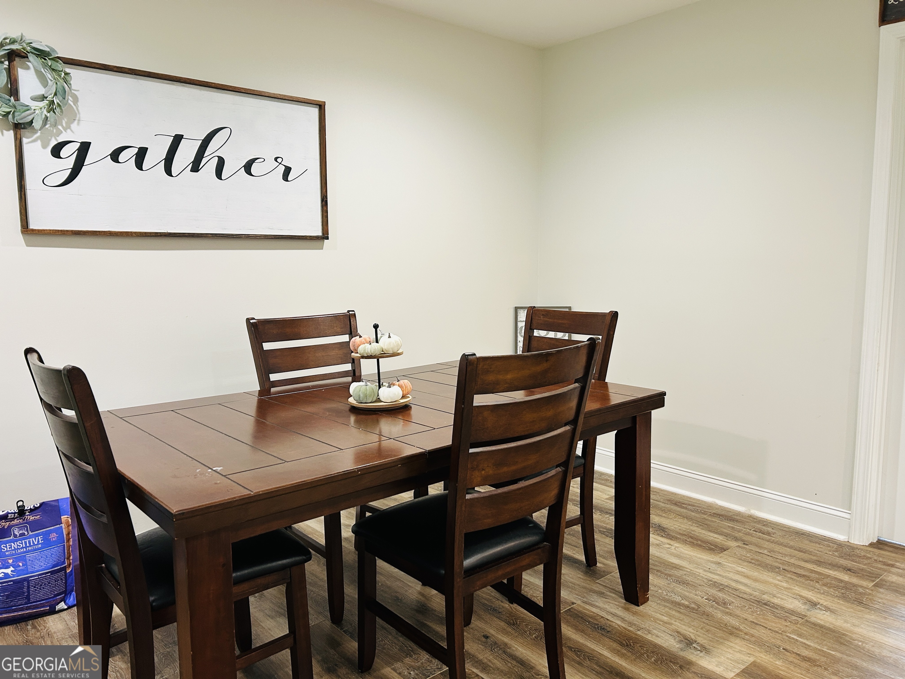 3077 Alec Mountain Road Clarkesville, GA 30523 - Photo 17 of 35 a view of a table and chairs in a room