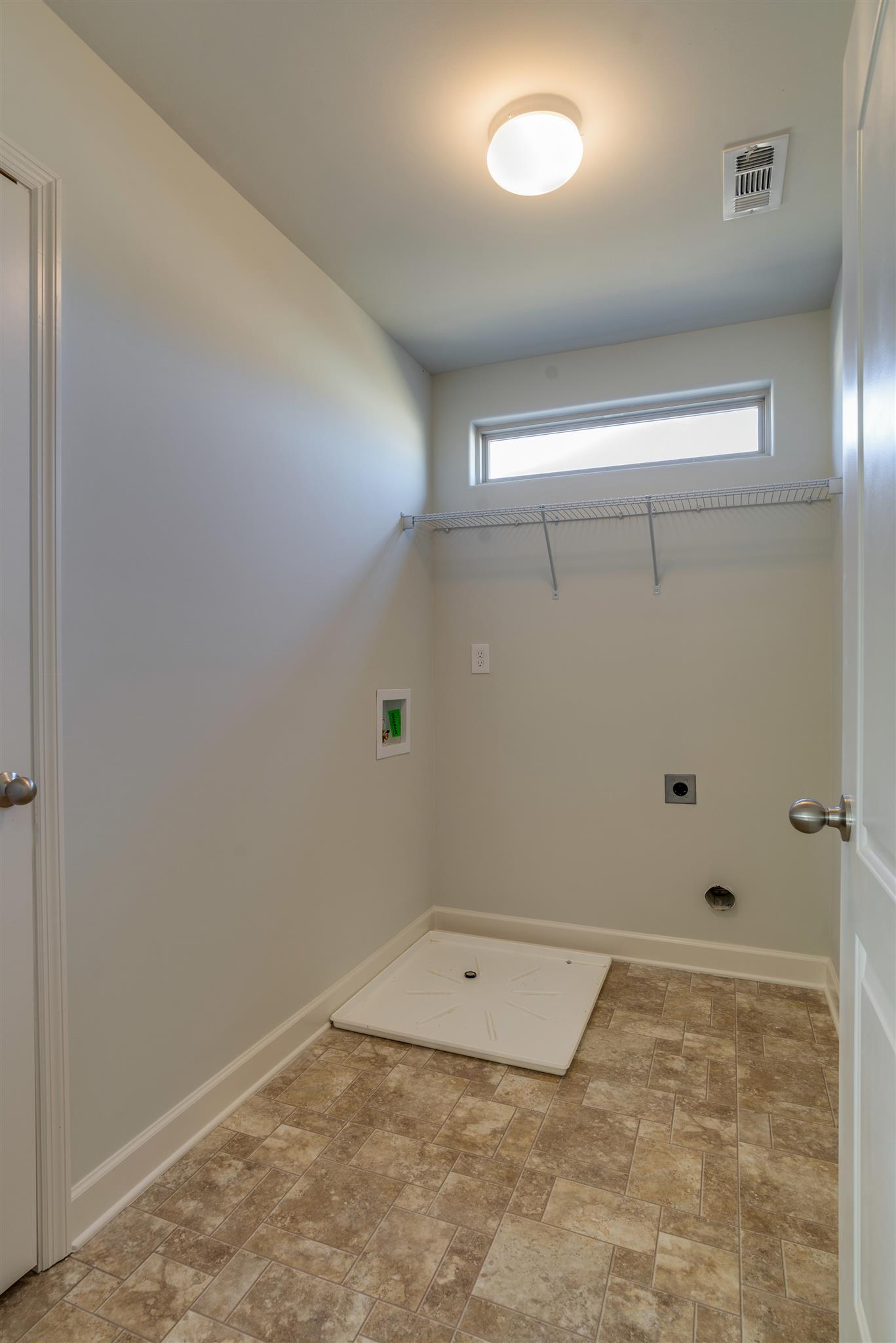 3003 Wesley Road Spring Hill, TN 37174 - Photo 13 of 16 Laundry room with storage closet