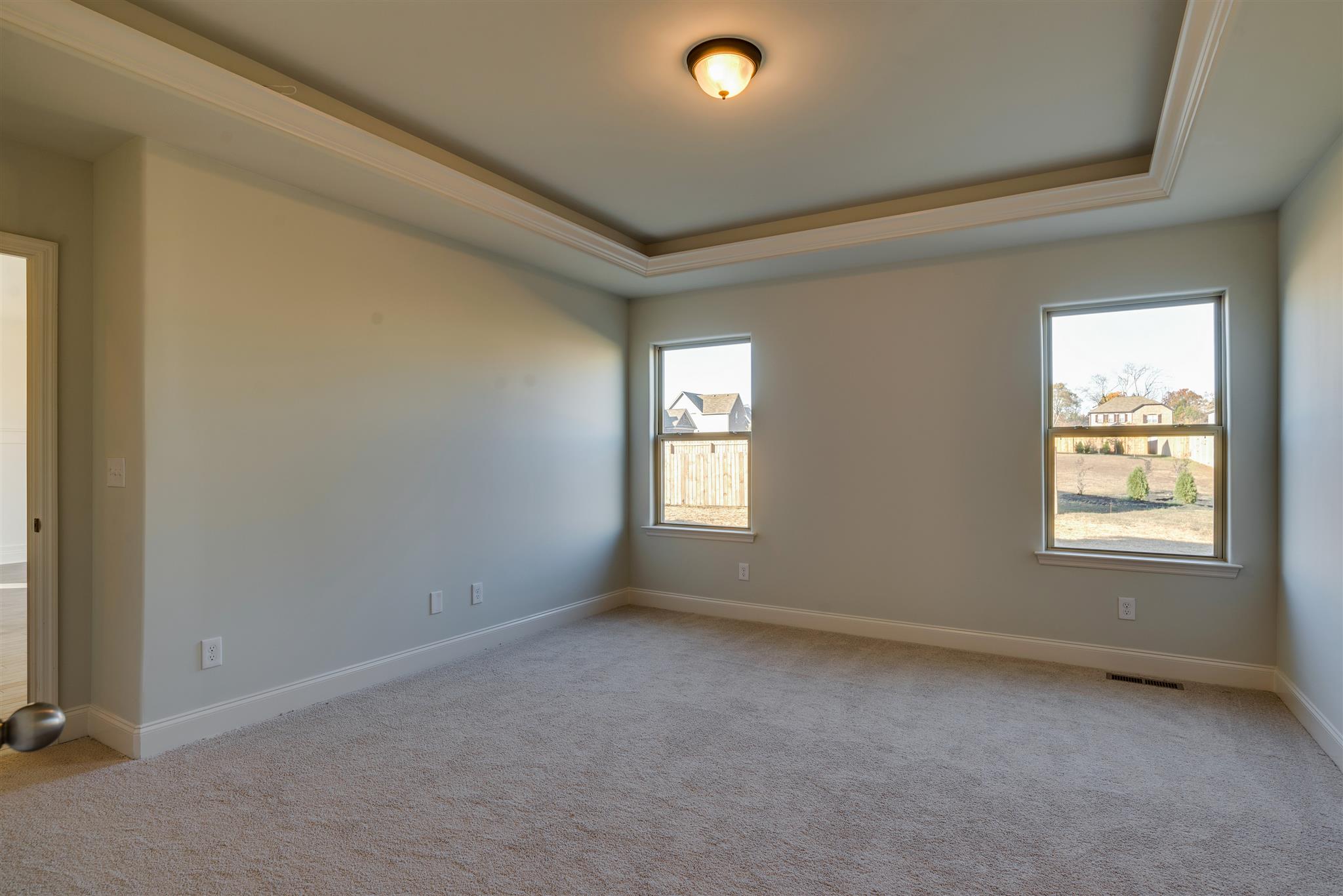 3003 Wesley Road Spring Hill, TN 37174 - Photo 6 of 16 Owners Bedroom on first floor with tray ceiling