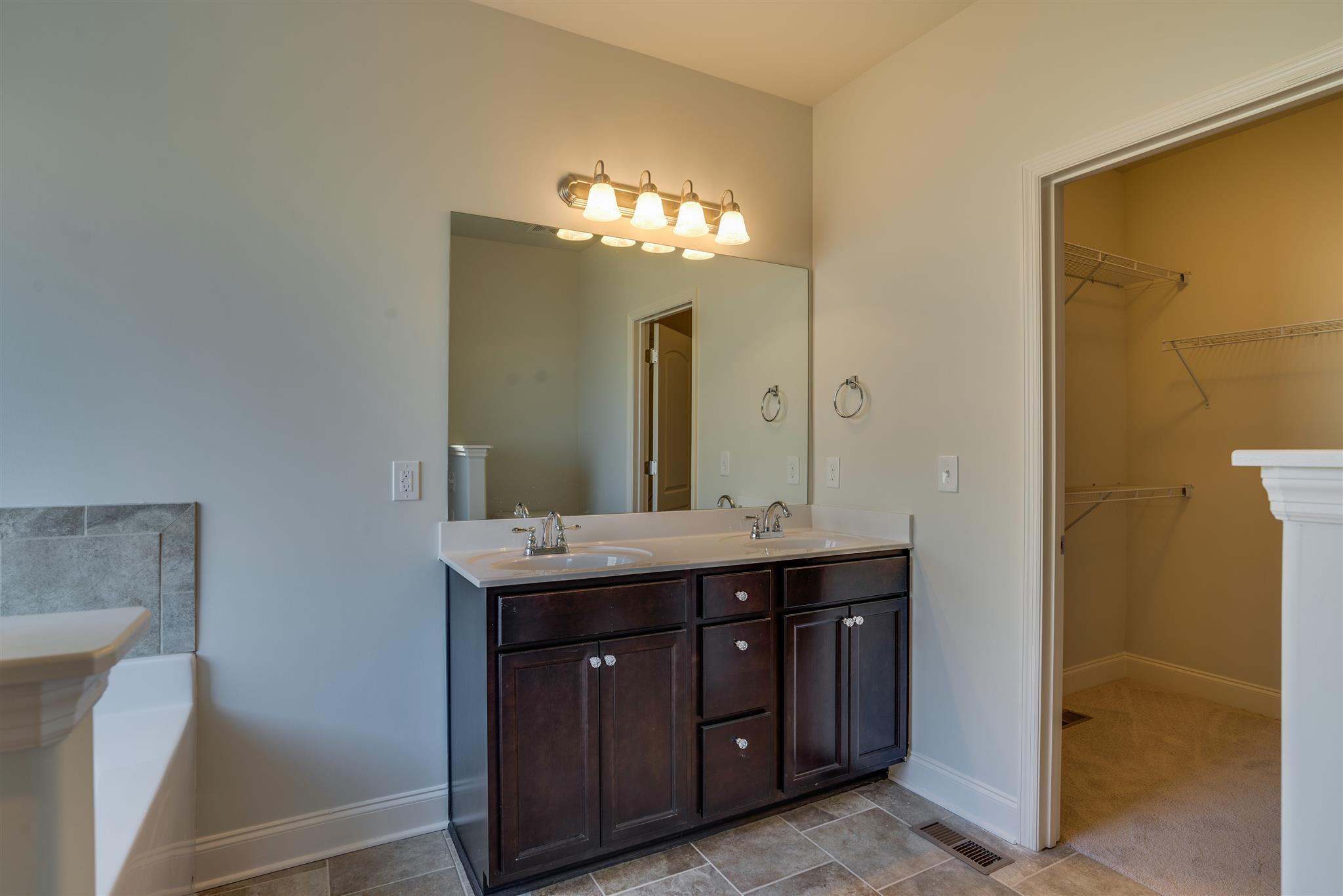 3003 Wesley Road Spring Hill, TN 37174 - Photo 7 of 16 Double sink with raised vanity in Owners Bedroom. That is the Owners closet on the right