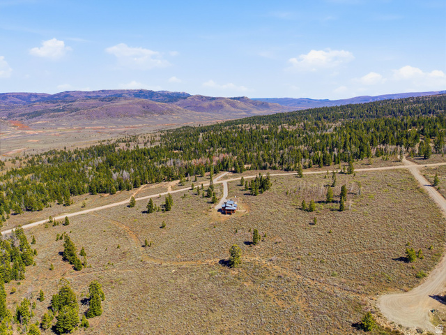 22677 East Snowbird Drive, Unit 47 Helper, UT 84526 - Photo 41 of 43 View of mountain backdrop with a heavily wooded area