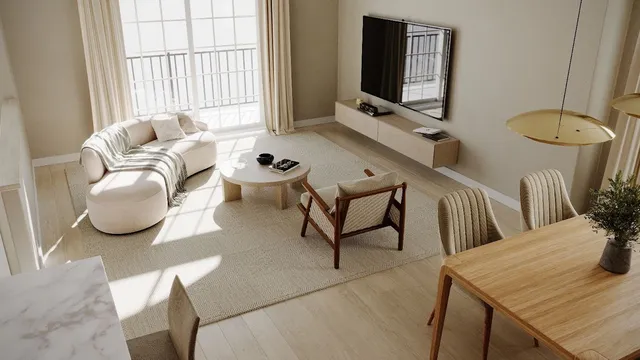 a living room with furniture and a flat screen tv