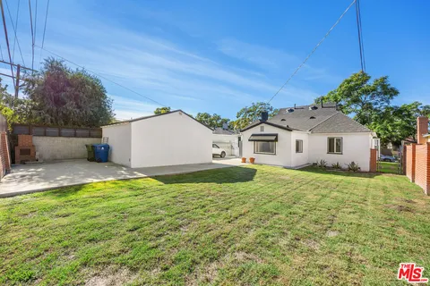 a house view with a garden space