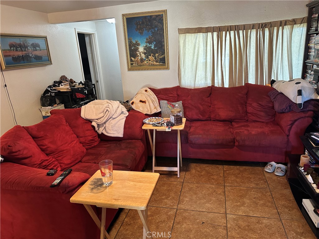 1105 Orange Avenue Chowchilla, CA 93610 - Photo 34 of 41 living room looking back to front door and enteyway