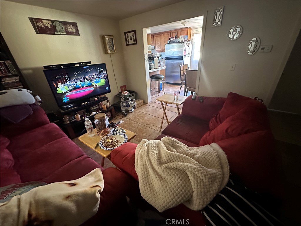 1105 Orange Avenue Chowchilla, CA 93610 - Photo 5 of 41 living room looking towards kitchen