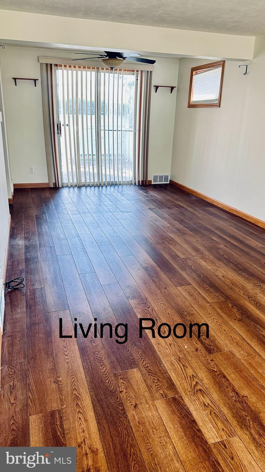 215 West Roland Road Brookhaven, PA 19015 - Photo 2 of 21 Living area with entrance to deck.