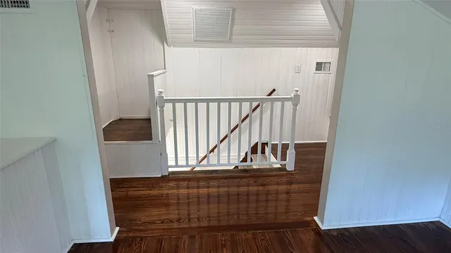 a view of entryway with wooden floor