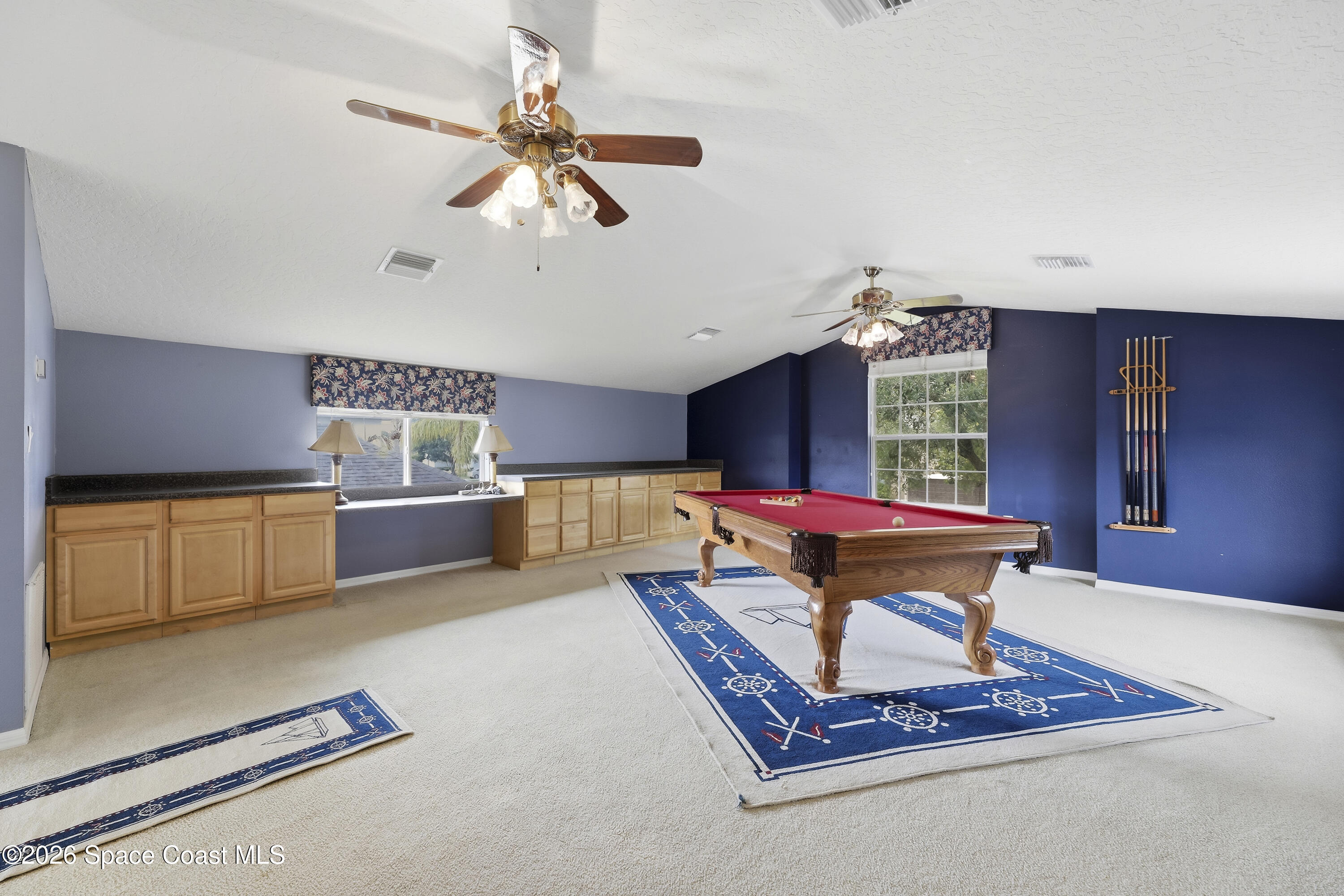 1643 Long Pine Road Melbourne, FL 32940 - Photo 42 of 63 a living room with furniture pool table and window